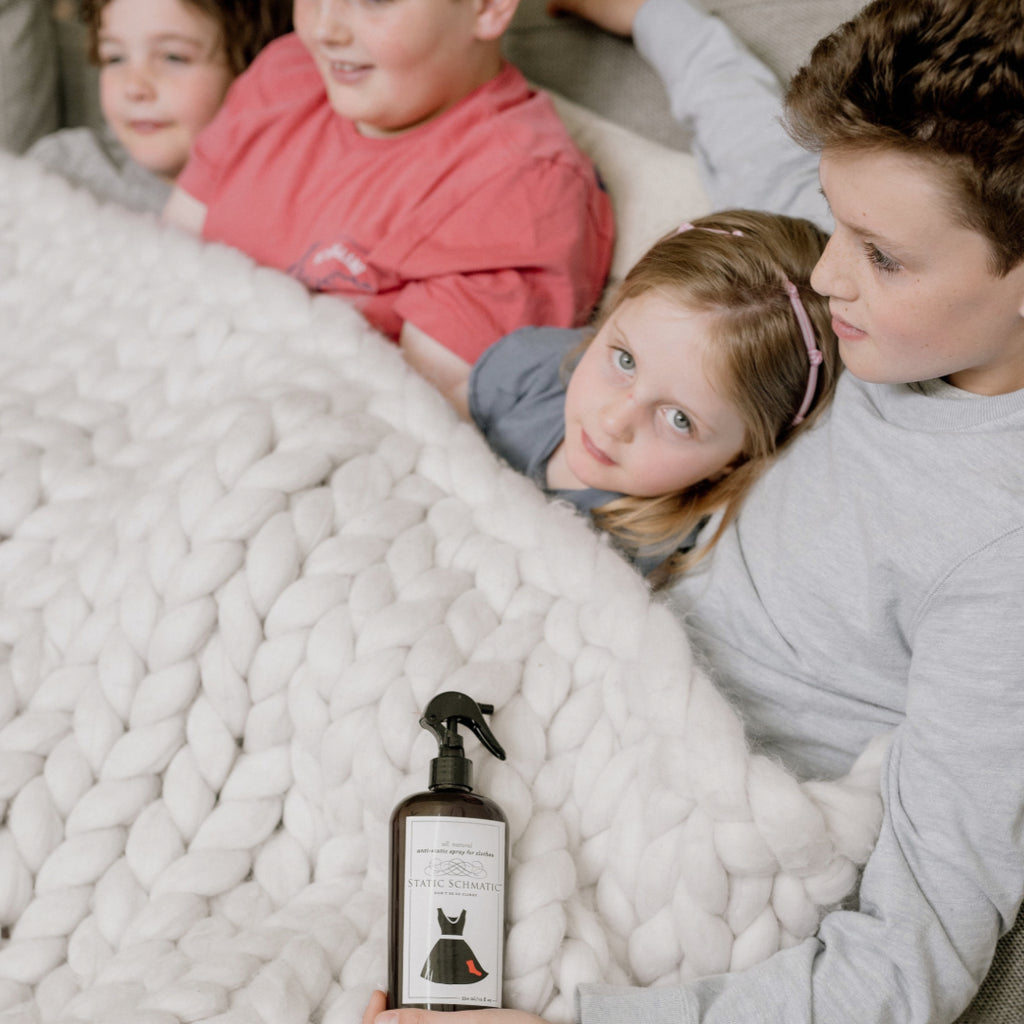 Static Schmatic Laundry Size with Kids under a cozy blanket for all natural static cling relief